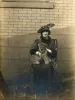 Lois Pantages poses with lion cub
